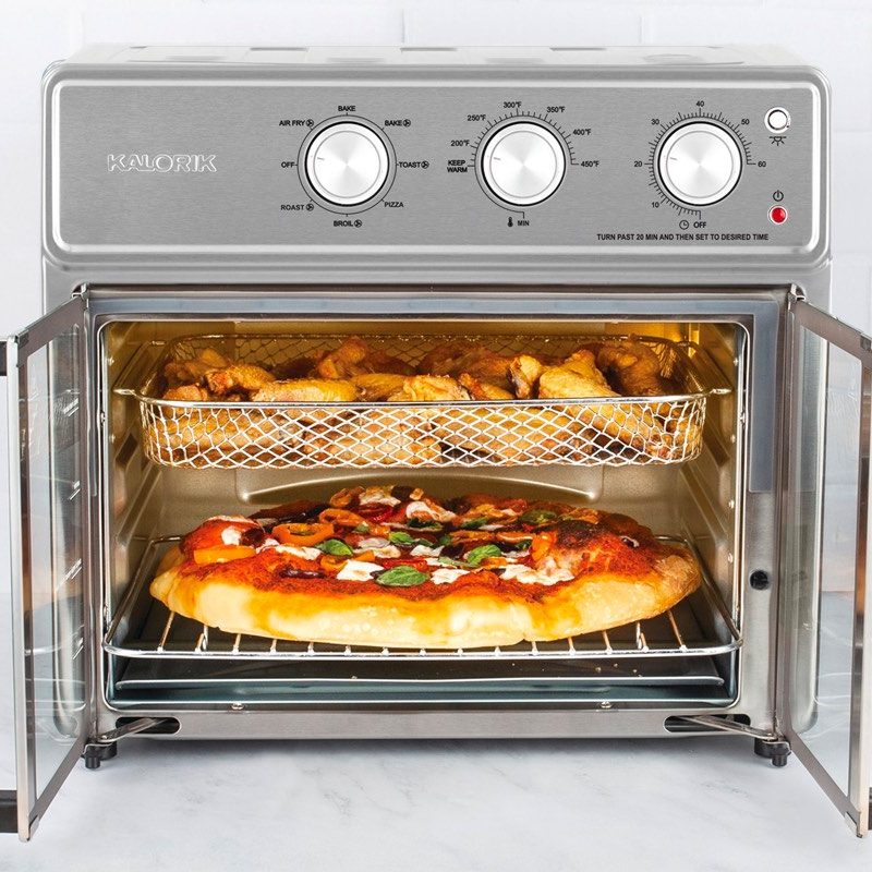 The Kalorik Maxx 16-quart air fryer cooks wings and pizza at the same time.