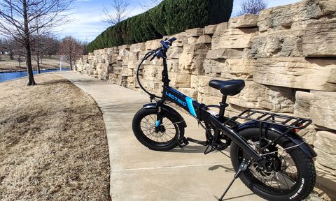 Lectric XP 2.0 Black electric bike on an outdoor walking path.