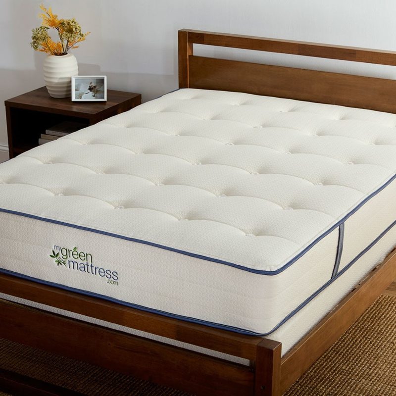 A My Green Mattress Natural Escape mattress in a bedroom.