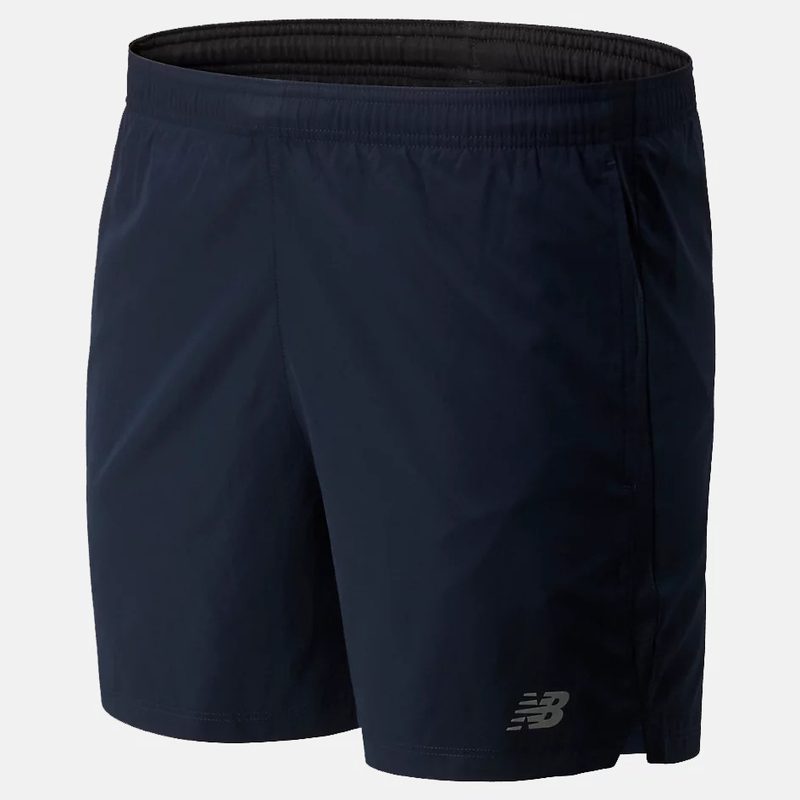 A New Balance Accelerate Shorts in navy on gray background.