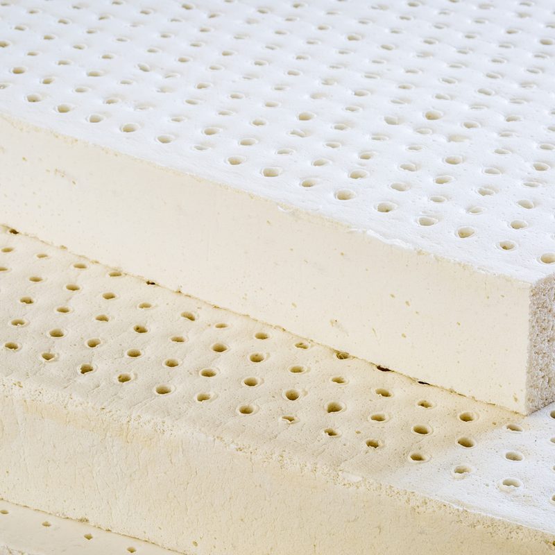 A close-up of three layers of natural latex material.