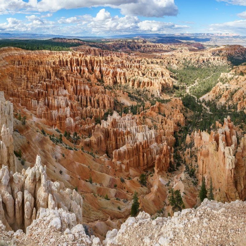 Brown rock spires rise from a view at the top of the Peek-A-Boo Loop Trail in Bryce Canyon, Utah.