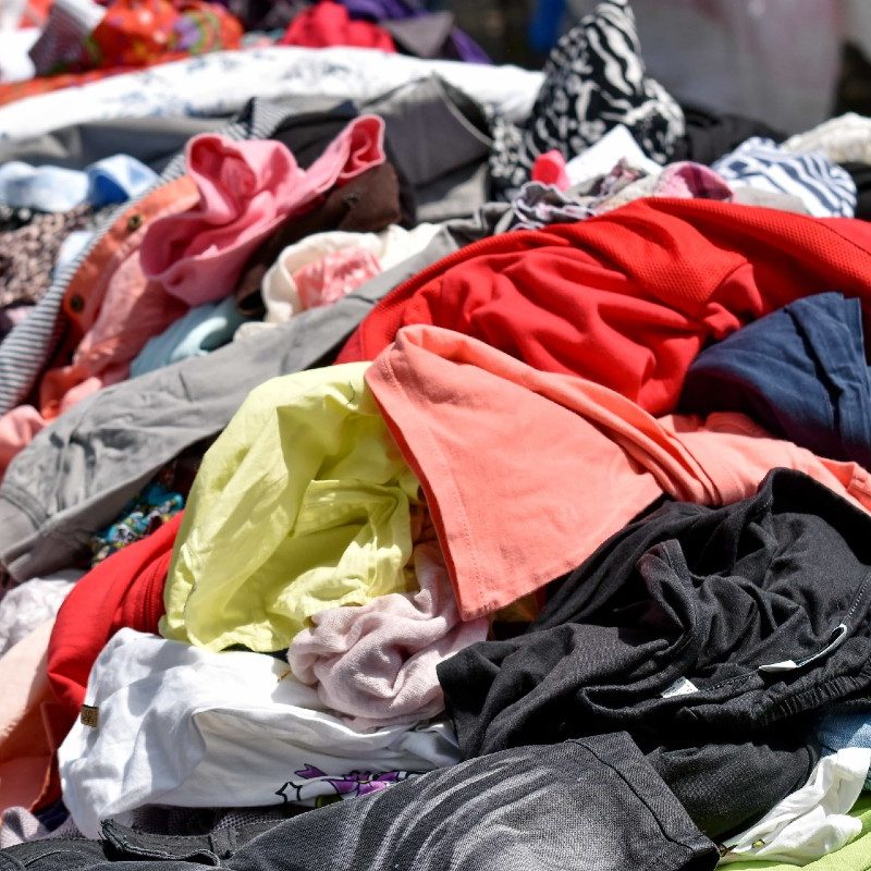 A pile of multi-patterned textiles.