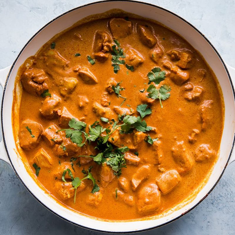 Overhead shot of a pot of butter chicken.