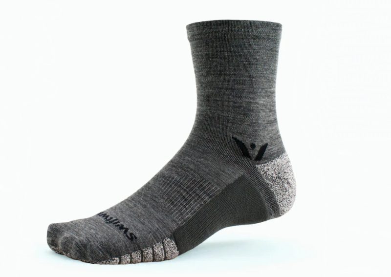 Swiftwick flite xt trail performance socks in the studio.
