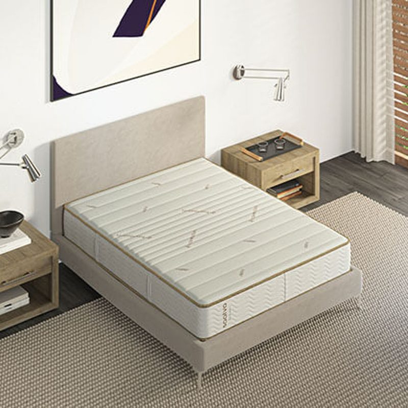 The Saatva Zenhaven Natural Latex mattress in a bedroom.