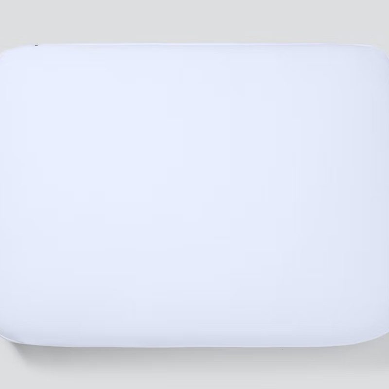 An overhead shot of The Casper Foam Pillow on gray background.