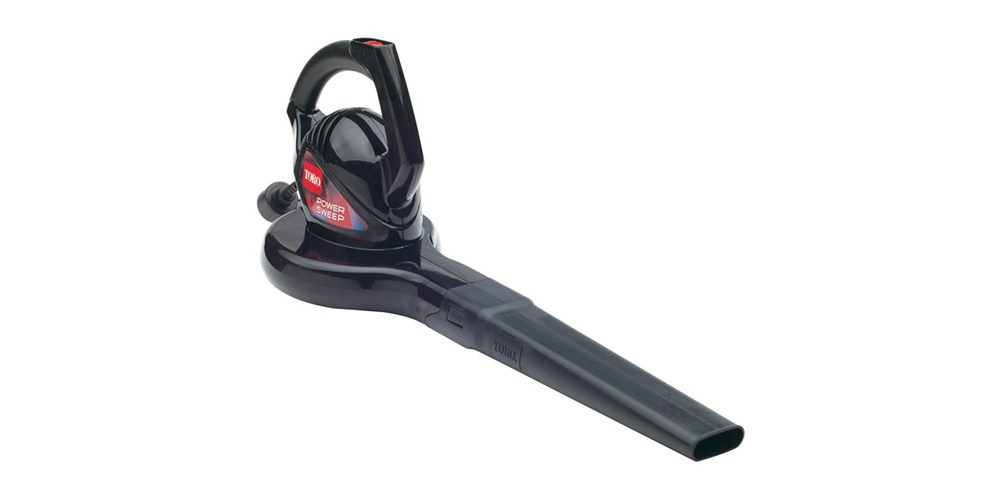 Toro Power Sweep Blower at a side angle on a white background.