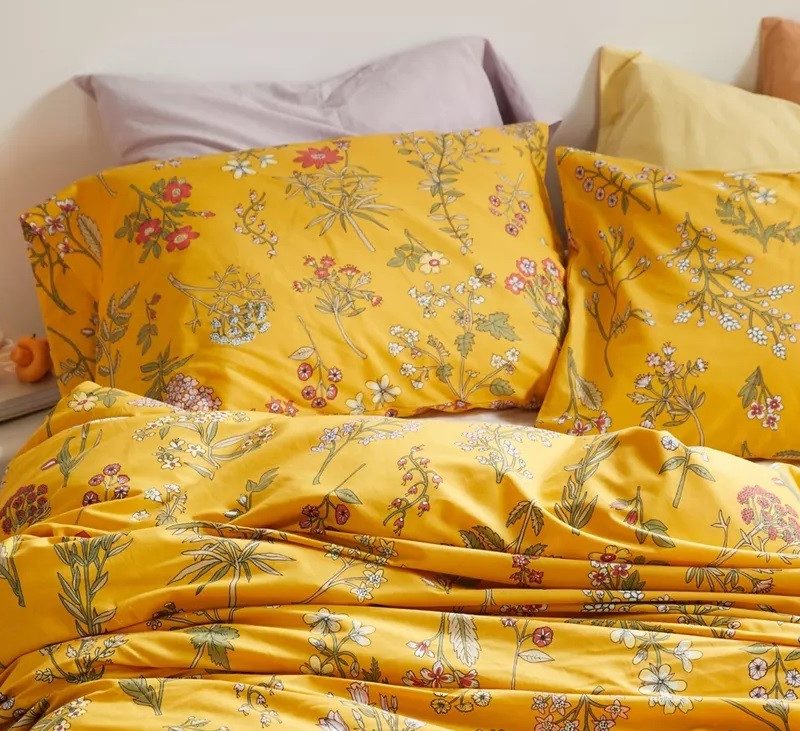 Urban Outfitters Myla Floral Duvet Set in spring colors.