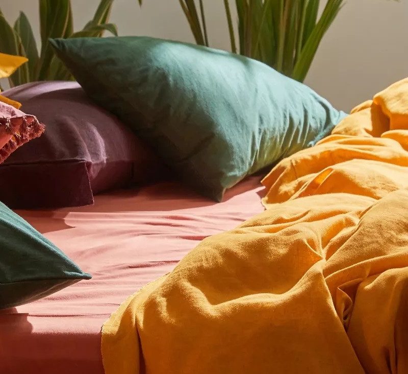 Urban Outfitters Palmer Linen Duvet Set in spring colors.
