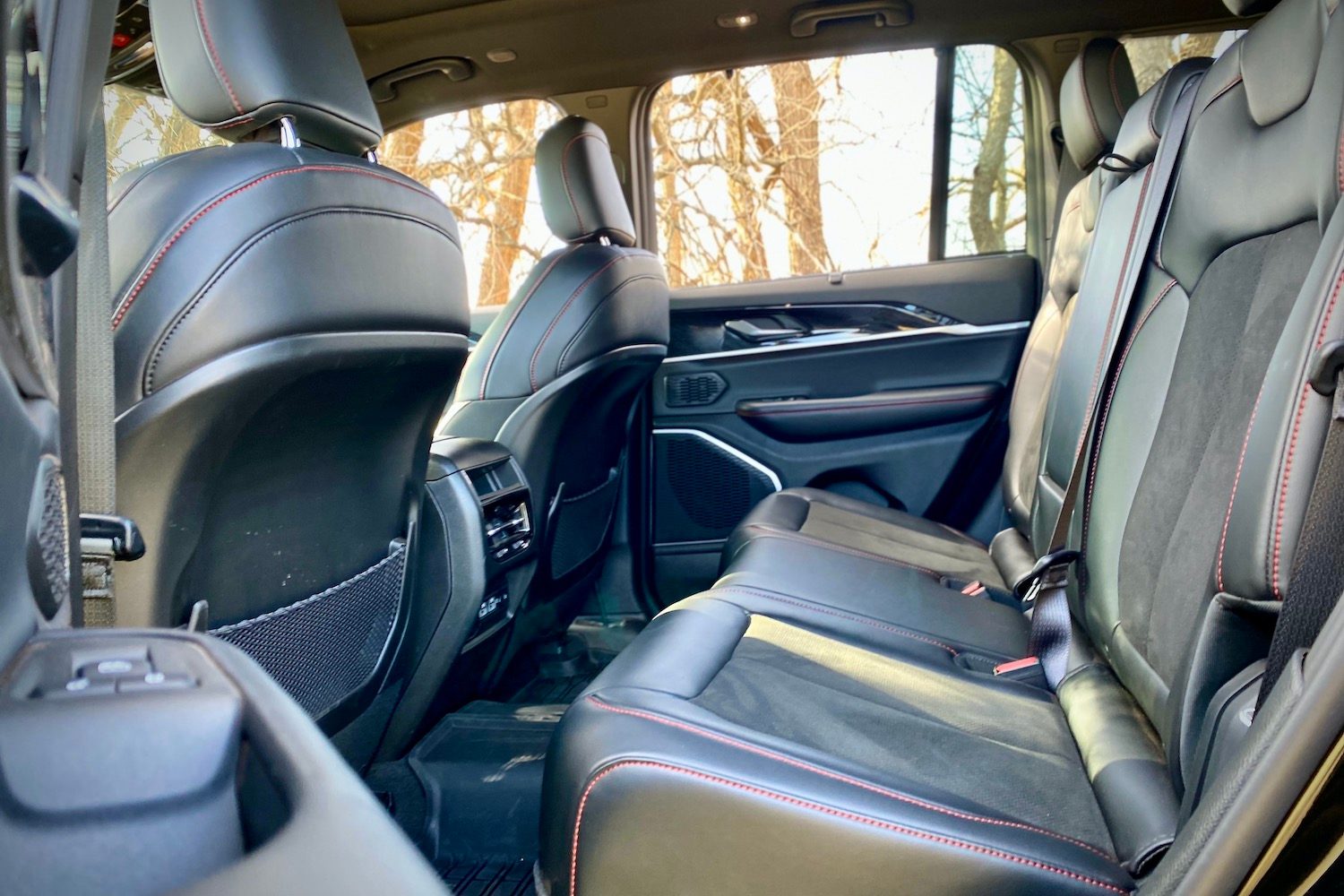 Rear seats in the 2022 Jeep Grand Cherokee Trailhawk from the driver's side.
