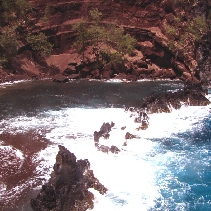 The red sand beach at Kaihalulu Beach, Hana, Maui