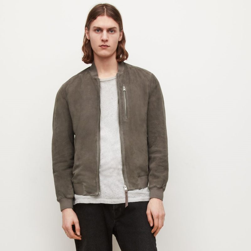 Kemble Suede Bomber Jacket worn by a model under a gray shirt.