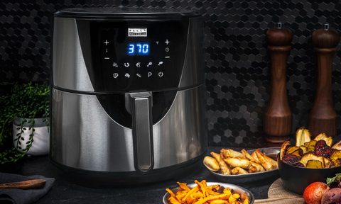 The Bella Pro Series 8-Quart Digital Air Fryer with some fried food at the side.