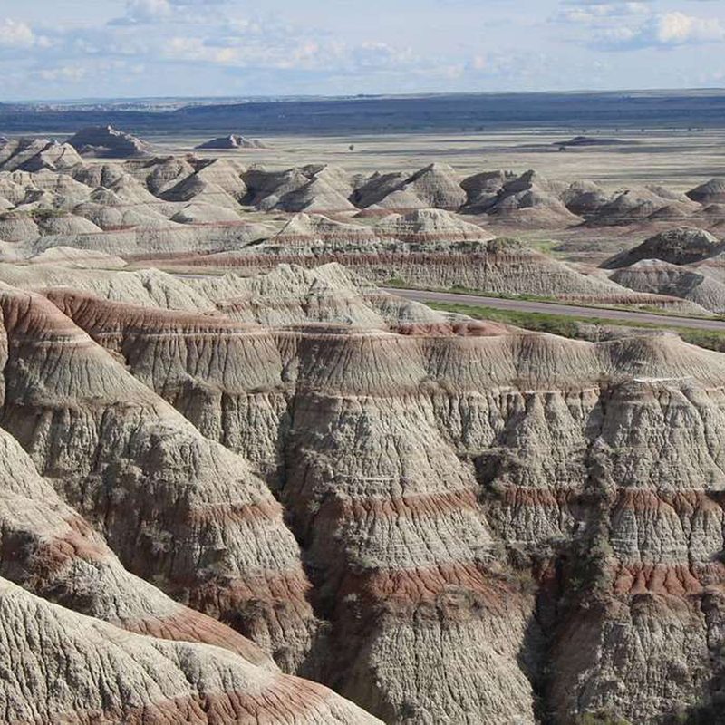 Towers of striated, sedimentary rock in South Dakota's Badlands from the Bigfoot Pass overlook.