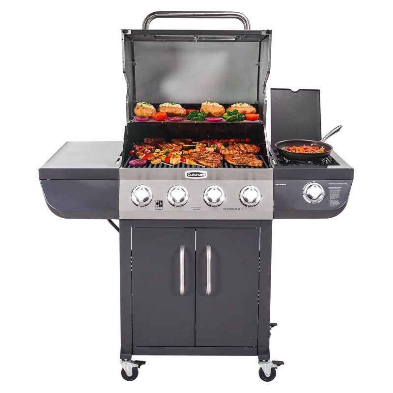 The Cuisinart 4-burner dual fuel gas grill sits open with various meats and vegetables on the grill.