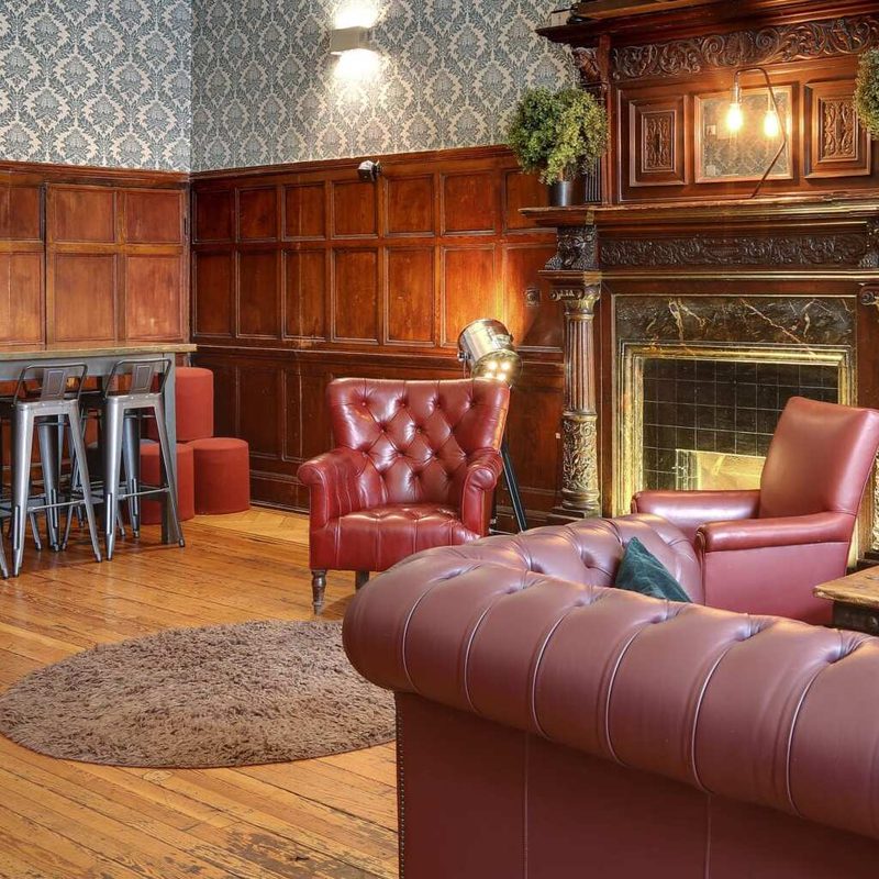Main room at Astor Hyde Park Hostel.
