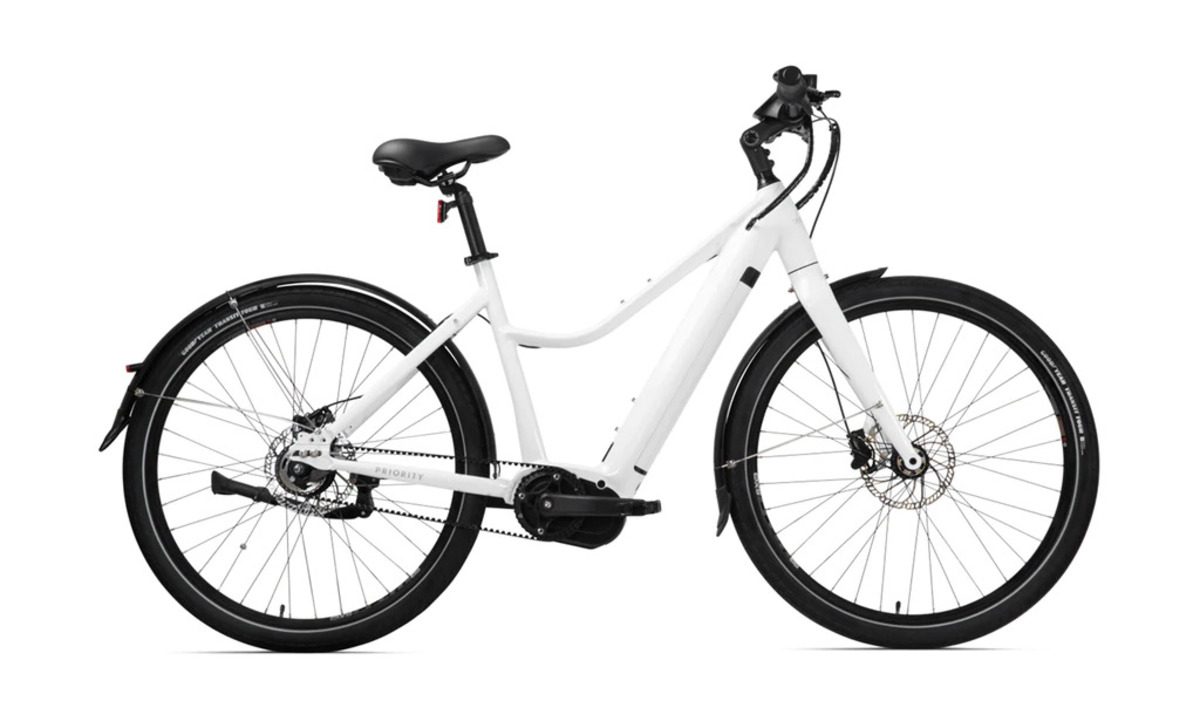 White Priority Current ebike against a white background.