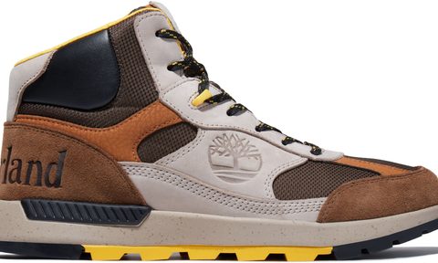 White and brown Timberland hiking boot on a white background.