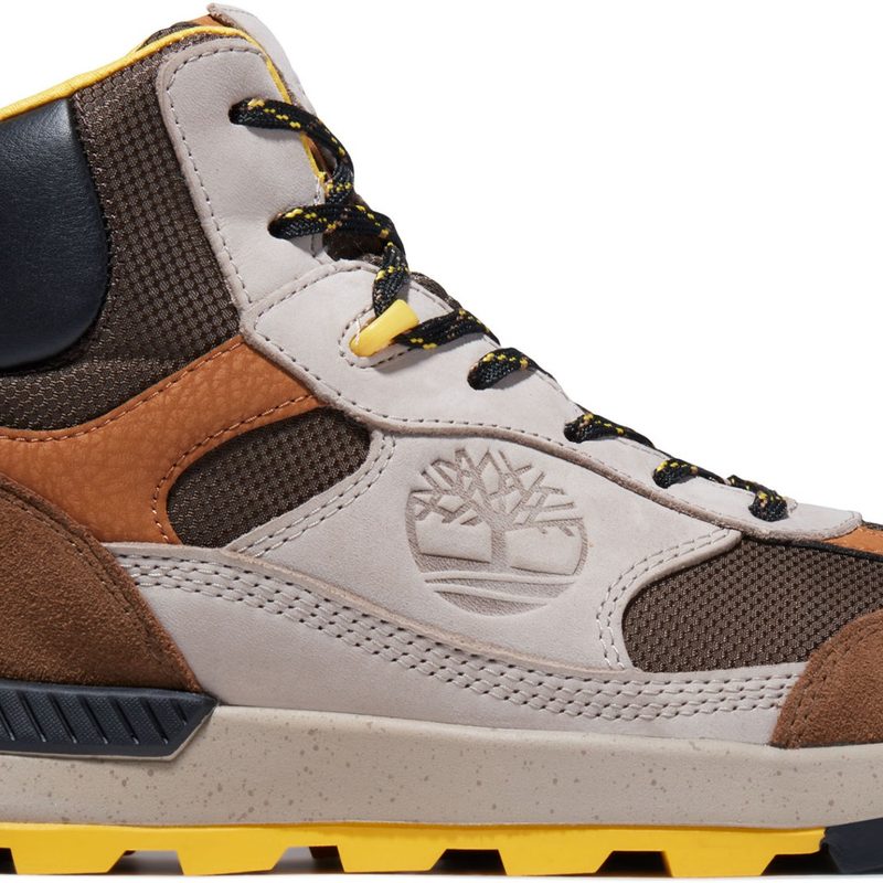 White and brown Timberland hiking boot on a white background.