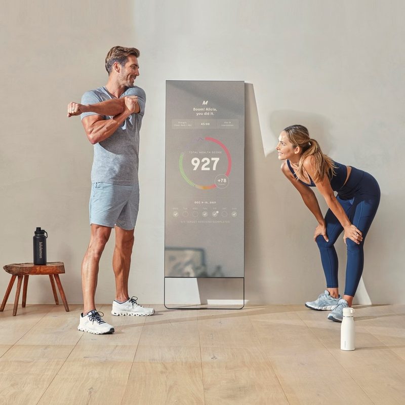 MIRROR by Lululemon in use in living room.
