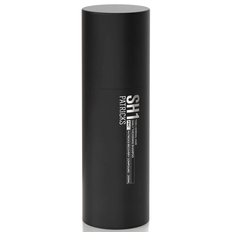 A bottle of Patricks Daily Thickening Shampoo.
