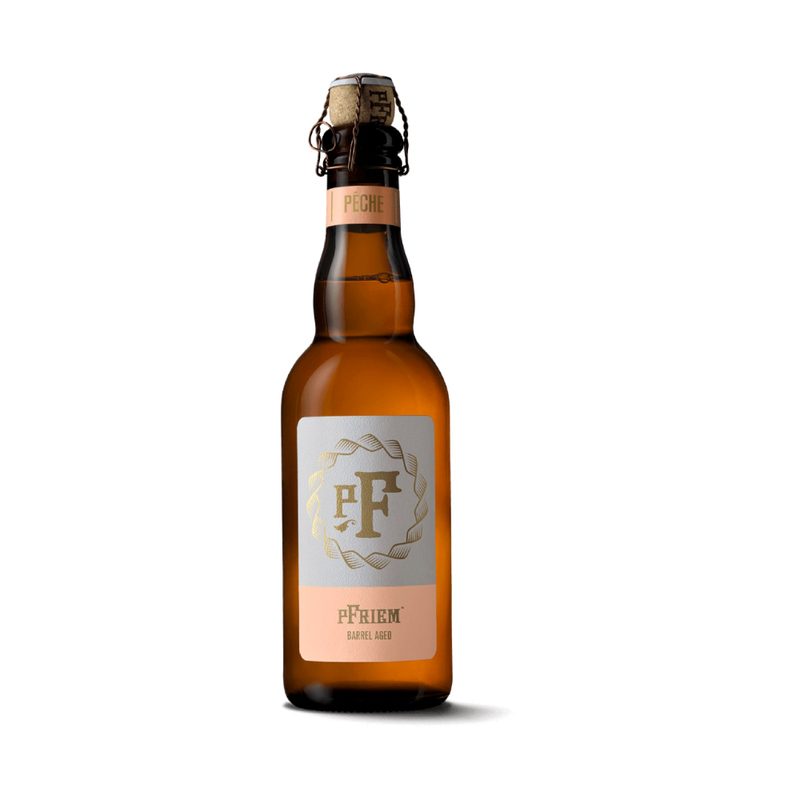 pFriem Peche beer bottle on a white background.