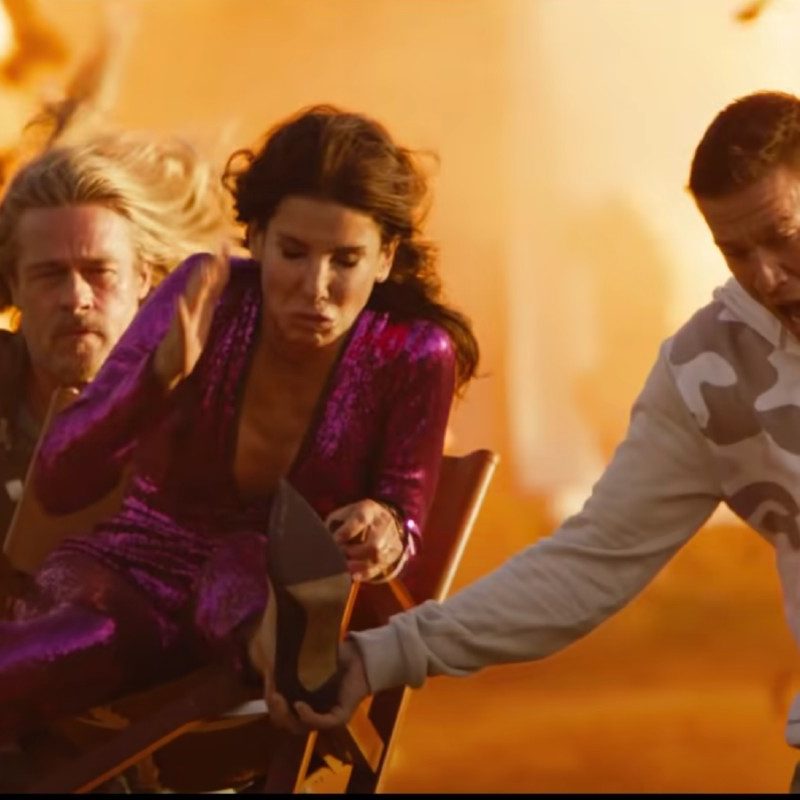 Brad Pitt (left), Sandra Bullock, and Channing Tatum (right) in 'The Lost City.'