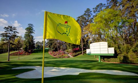 The Masters flag awaits the field at Augusta National Golf Club.