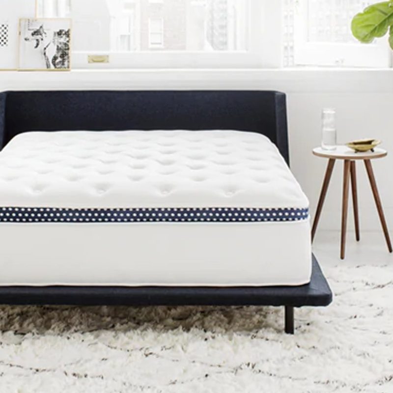 The WinkBed mattress in a bedroom.