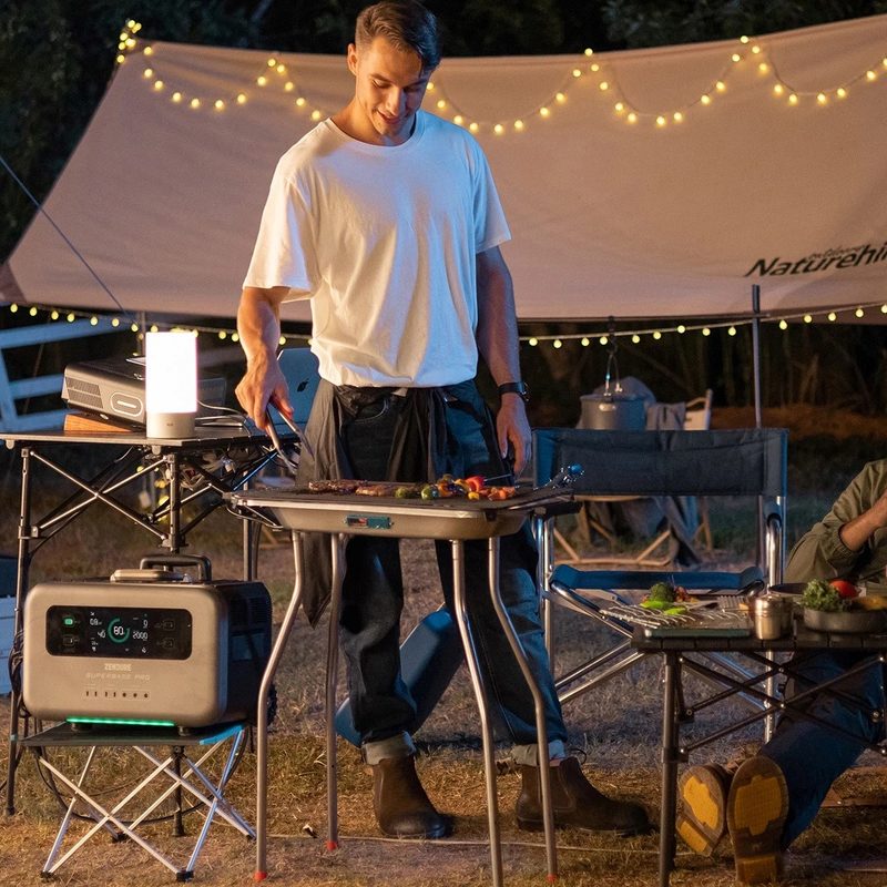 Zendure SuperBase Pro 2000 portable power station in camp.