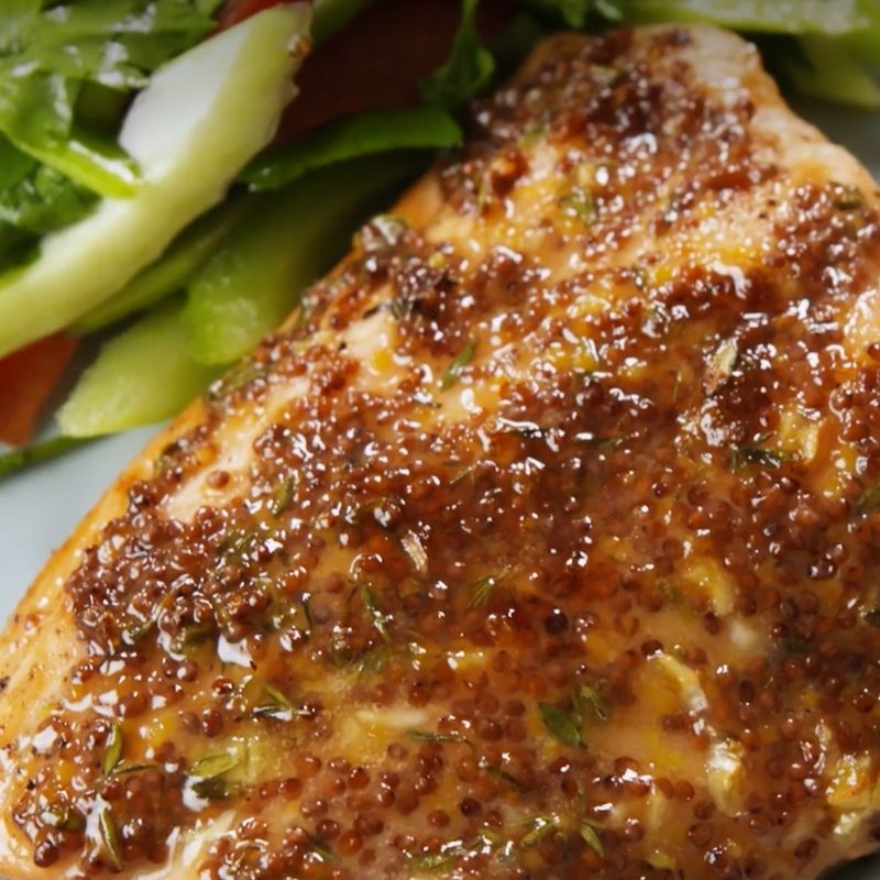 Air fryer salmon with salad on a plate