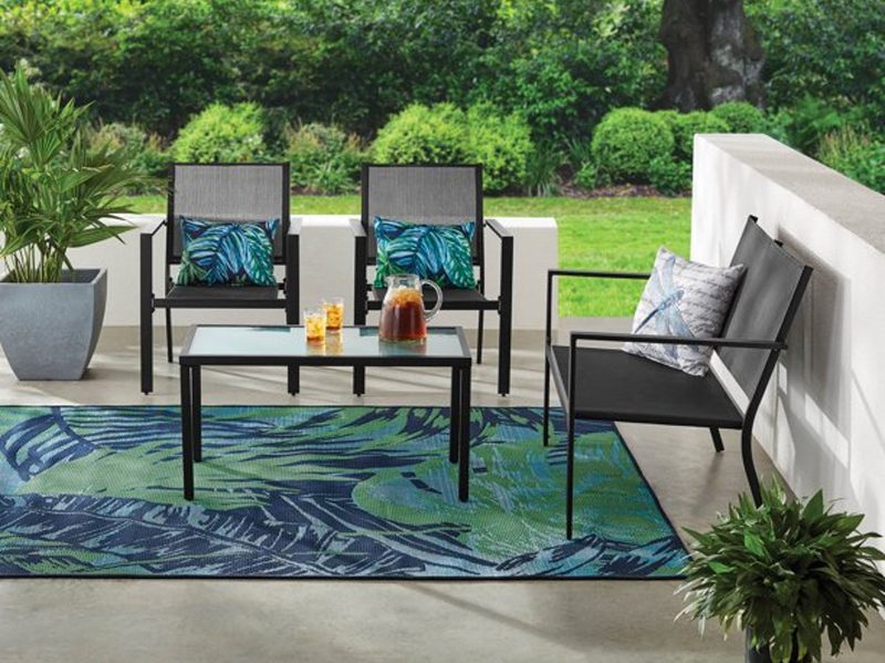 Mainstays Kingston Ridge 4-piece outdoor conversation set on concrete patio.