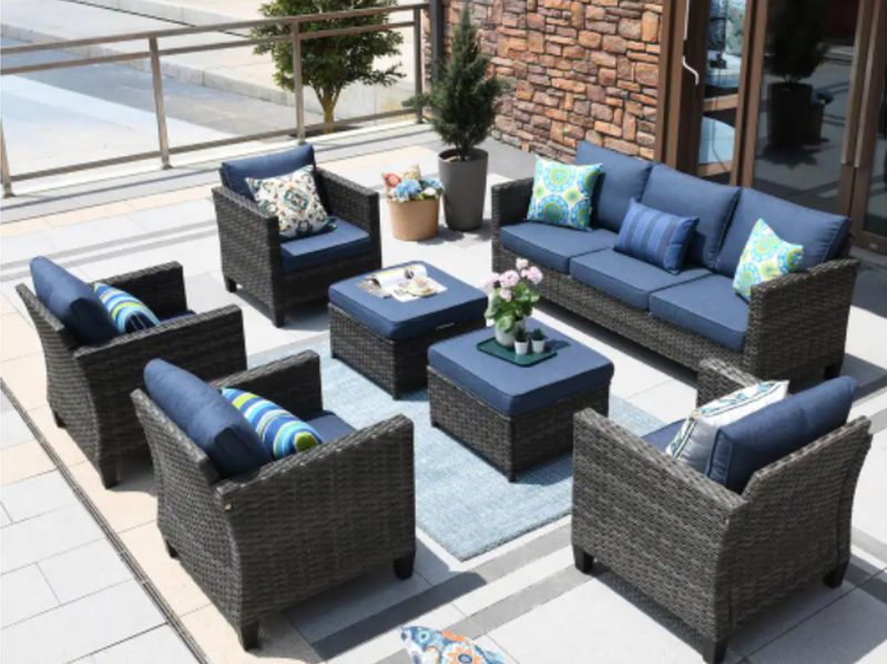 New Vultros Gray 7-piece wicker outdoor patio conversation seating set with blue cushions.