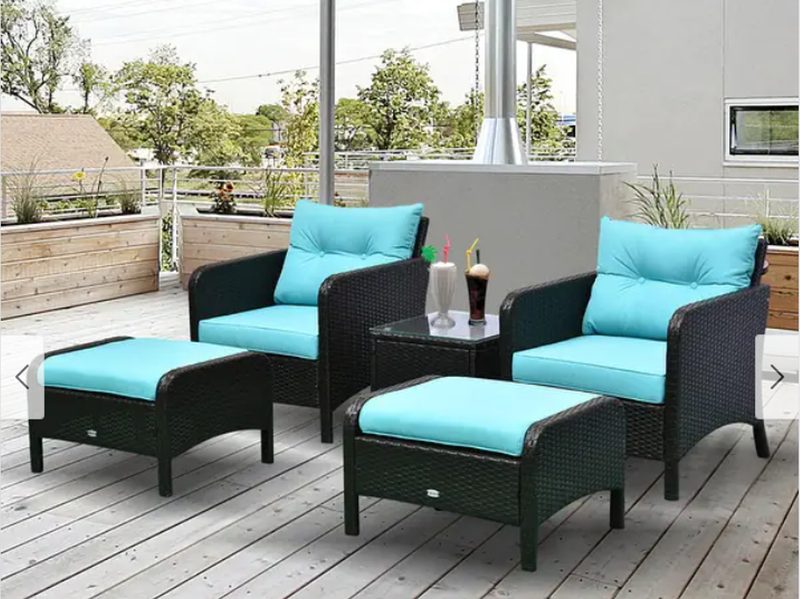 Outsunny 5-piece Rattan Wicker Outdoor Patio Conversation Set on a desk of a modern home.