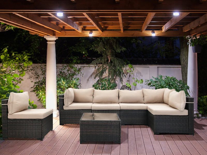Patio conversation set 7-piece rattan patio conversation set with cushions.