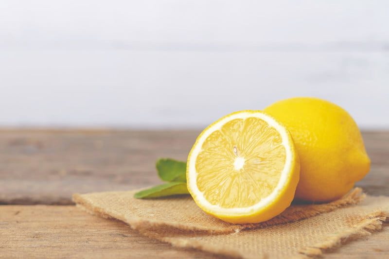 Cut lemon sitting on the counter.