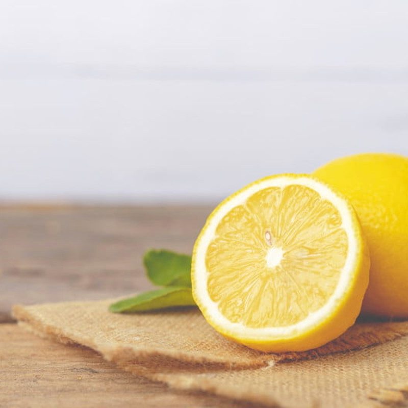 Cut lemon sitting on the counter.