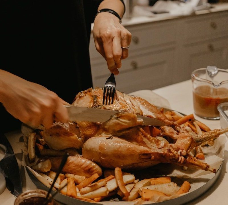 Cutting a chicken for dinner