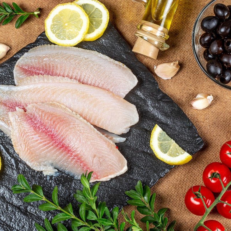 Fresh fillets of fish about to be cooked.