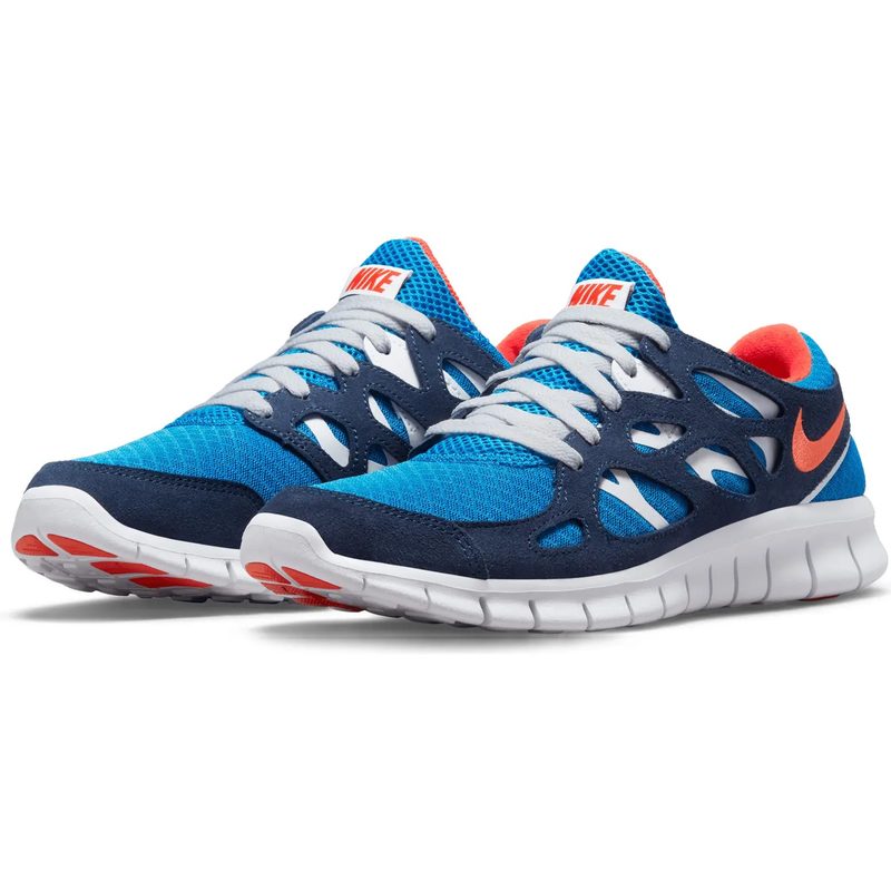 blue nike sneakers on a white background.