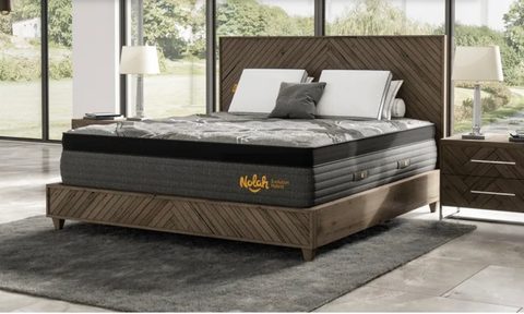 nolah evolution mattress in a brightly lit bedroom