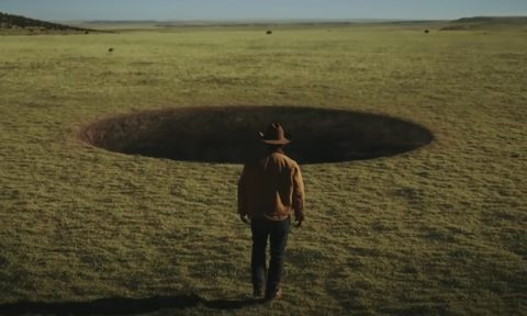 Josh Brolin as Royal Abbott approaches the weird black hole in his Wyoming ranch in Amazon Prime Video's 'Outer Range.'