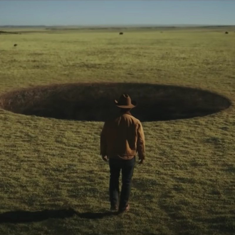 Josh Brolin as Royal Abbott approaches the weird black hole in his Wyoming ranch in Amazon Prime Video's 'Outer Range.'