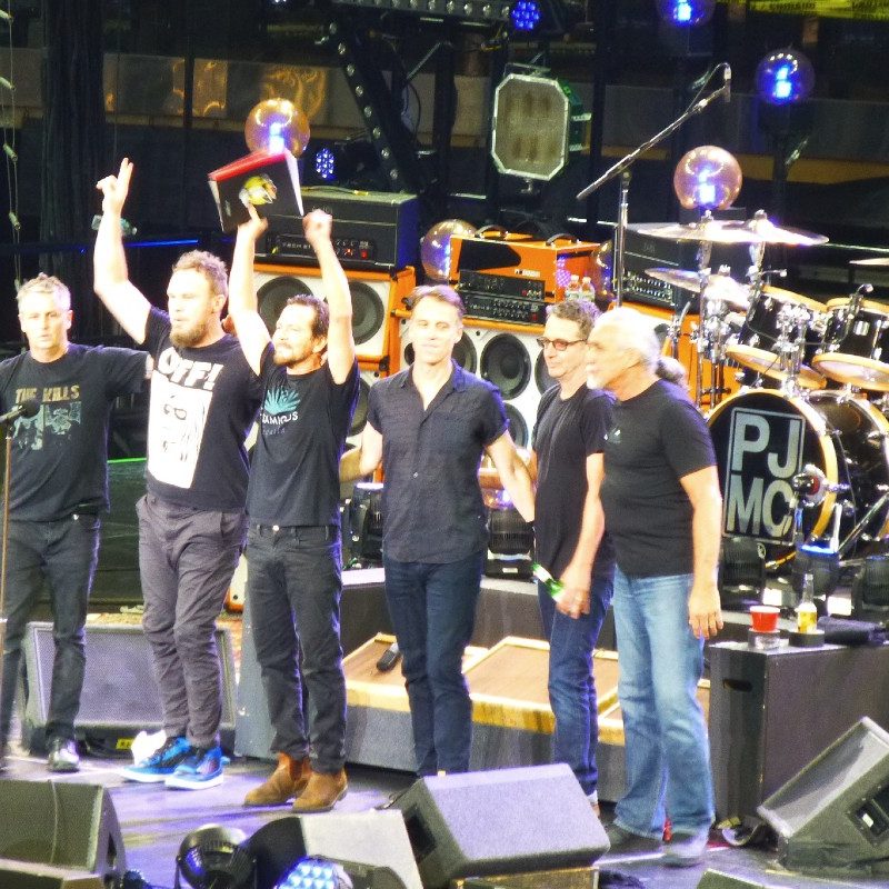 Pearl Jam bowing to fans at Madison Square Garden in New York City, 2016.