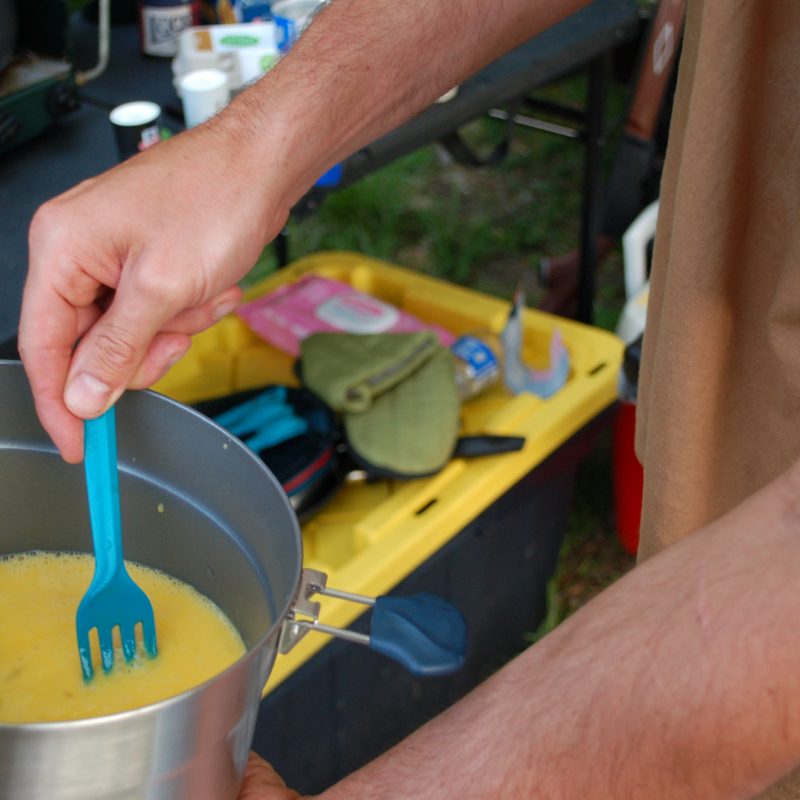 Preparing a meal with the quecha camp cookset pot.