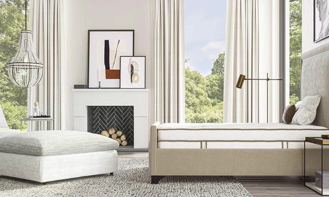 saatva latex hybrid mattress in a bright bedroom