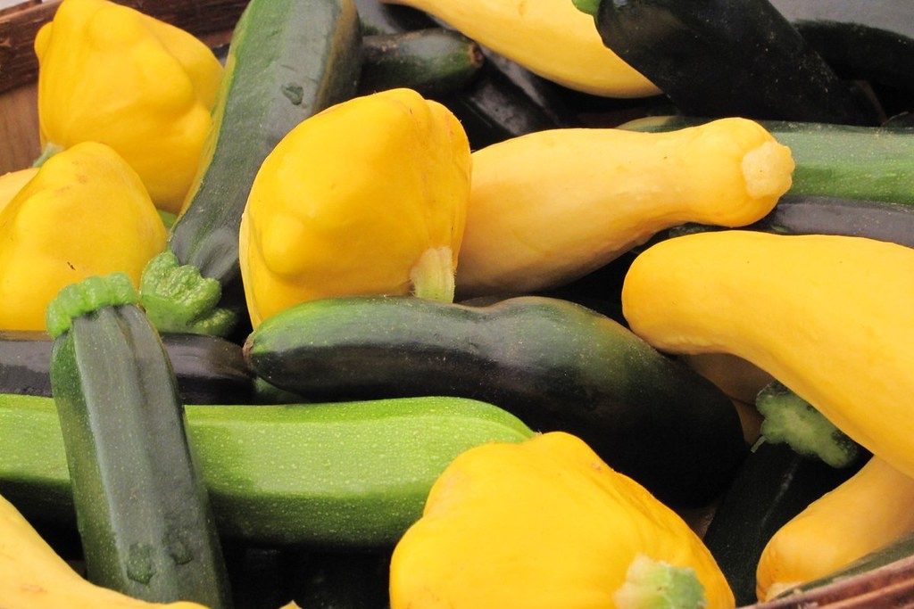 several varieties of summer squash in a bowl