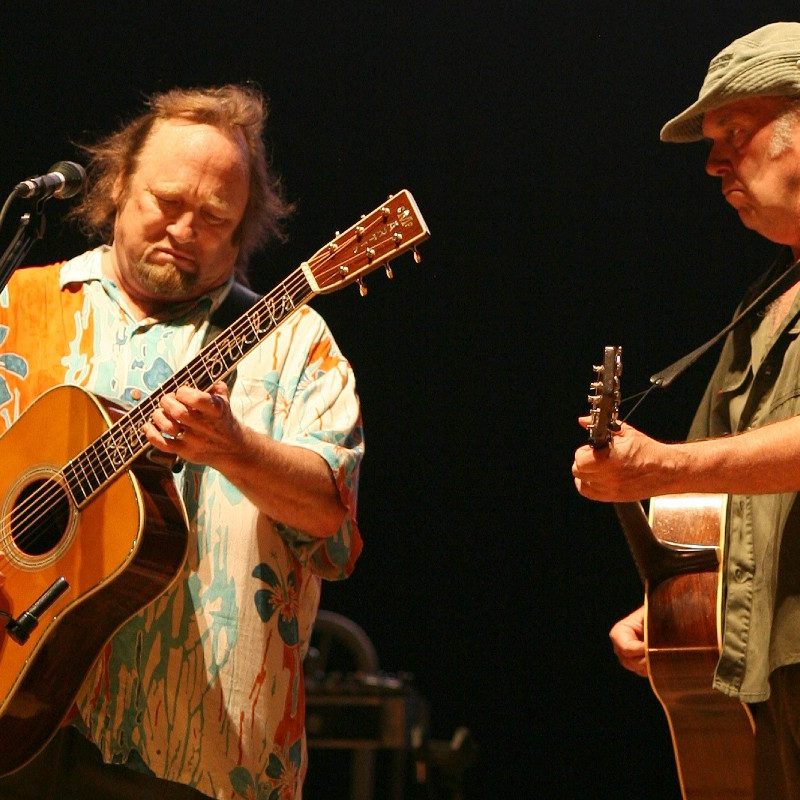 Stephen Stills (left) and Neil Young (right) performing together on the Crosby, Stills, Nash & Young 2006 tour.