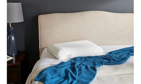 Tempur-Cloud Pillow placed on a bed.